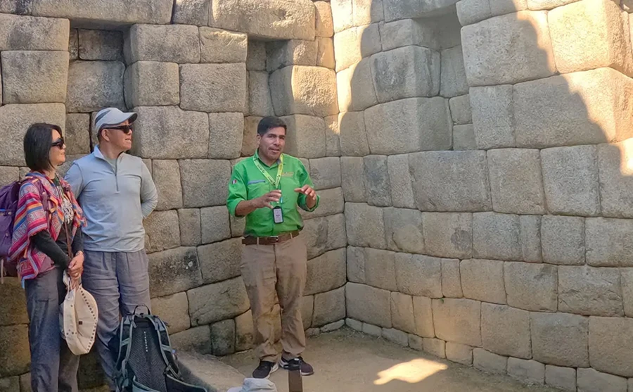 Expert private guide pointing at ruins